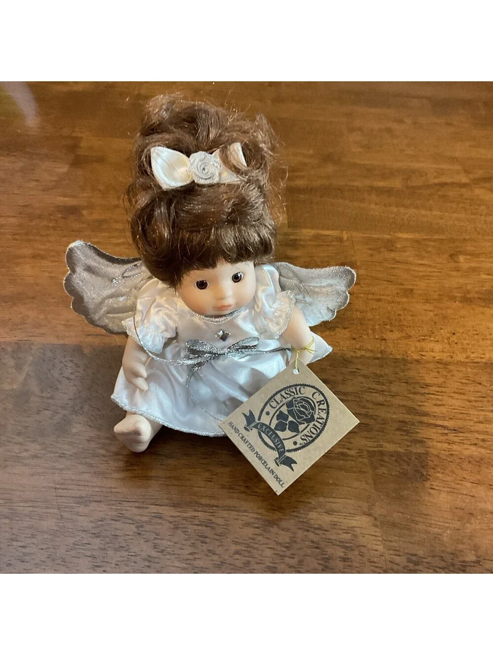 Classic Creations Porcelain Birthstone Angel doll with Gray Wings